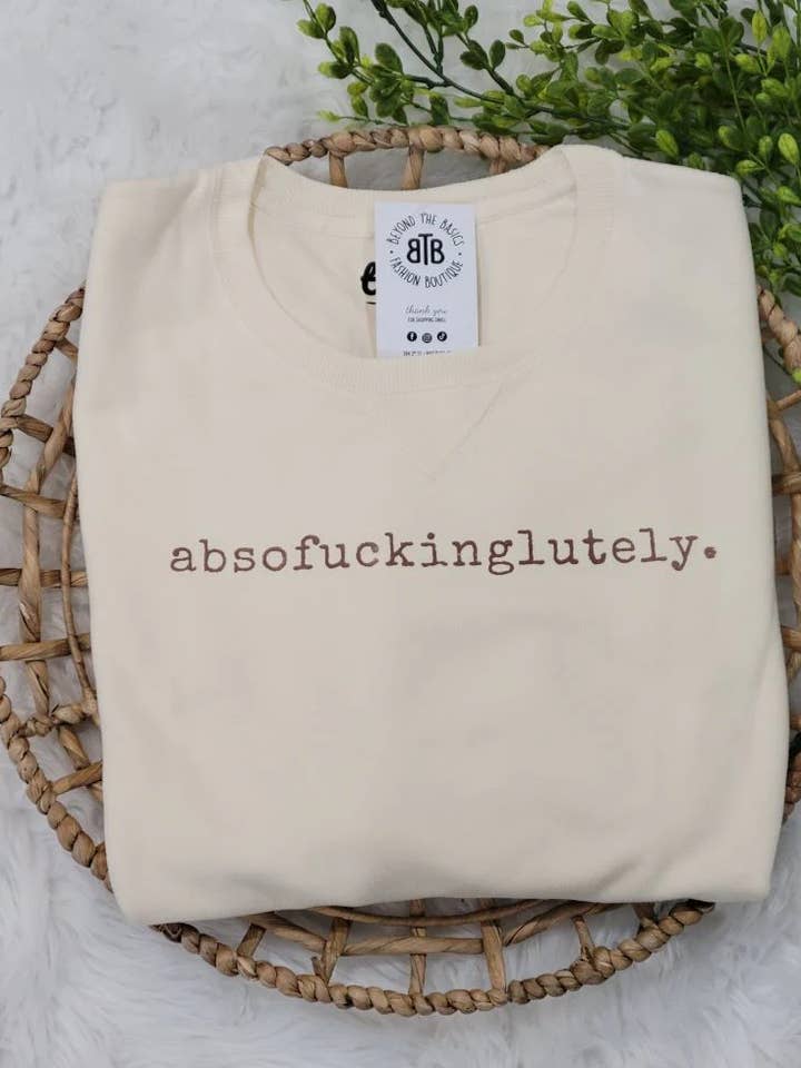 Sweatshirt Équipe Absofuckinglutely - Ivoire pour la vente par three WILD THREADS
