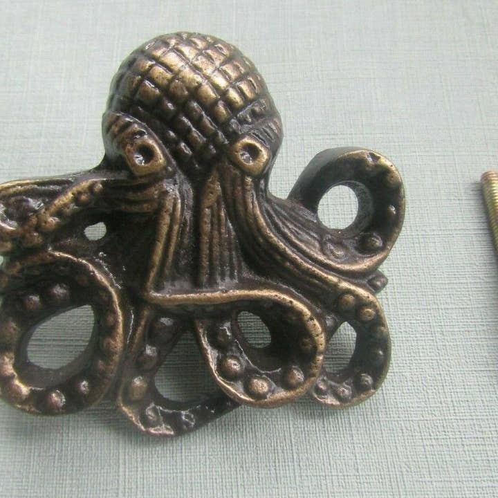 Octopus Cabinet Knob Antique Brass for wholesale by IronmongeryWorld