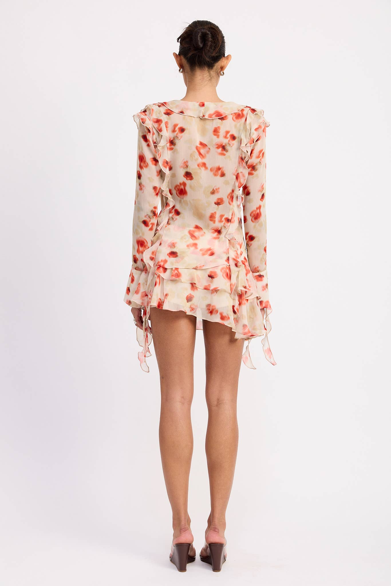 TOMATE FLORAL MINISSAIA COM FOLHOS EM CAMADAS EM ESTAMPA FLORAL TRANSPARENTE para venda a revendedores na Faire6