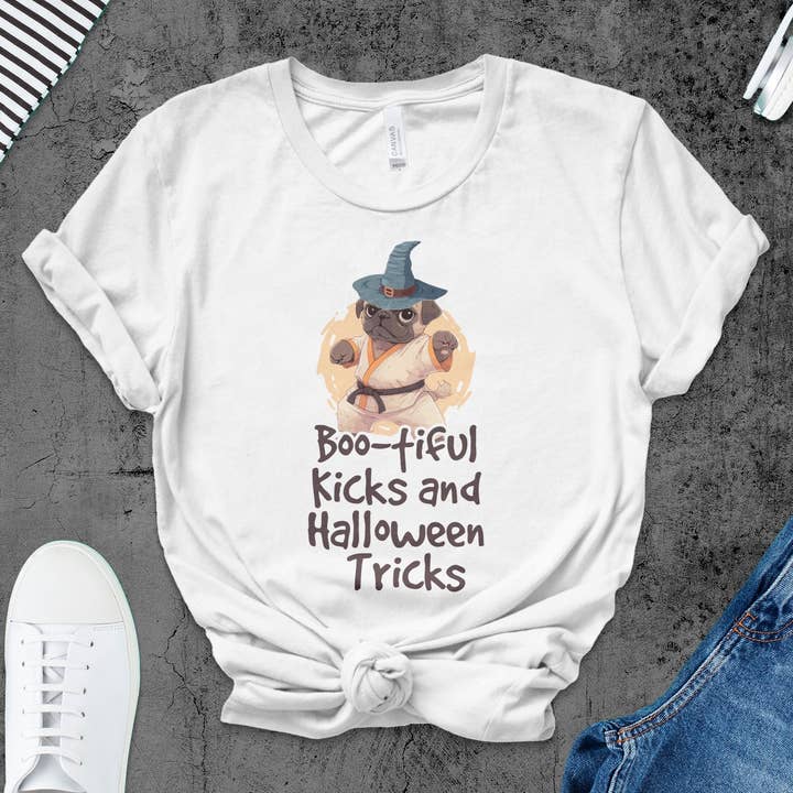 Cute Pug Witch Halloween T-Shirt, Boo-tiful Kicks and Tricks, Funny Dog Lover Tee, October Fall Festival Apparel, Unisex Gift for wholesale by FreakyTeeFactory