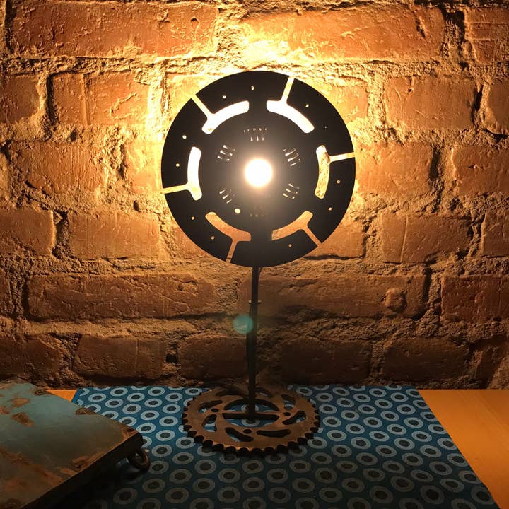 Upcycled “Suzanne” lamp made from recycled clutch disc for wholesale by Moogoo Creative Africa