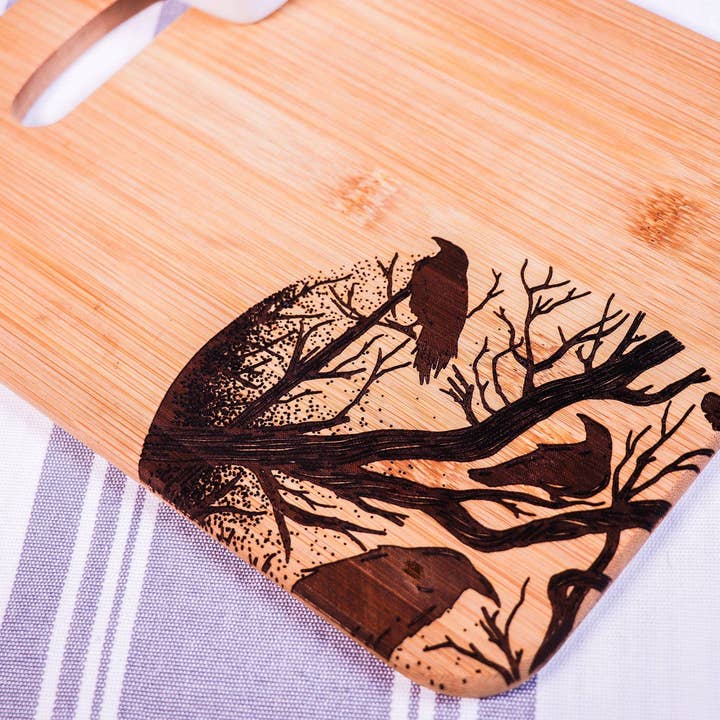Ravens in Branches Engraved Bamboo Cutting Board for wholesale by Rustic Cedar Co