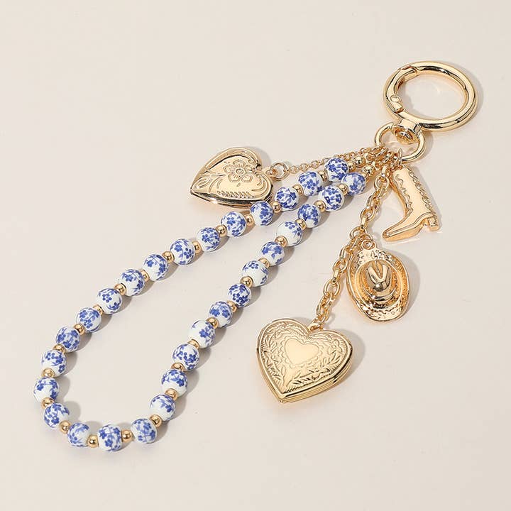 Sensibling Corp. - Wholesale Keychain - Women's - Heart Locket Cowboy Ceramic Ball Wristlet Keychain Bag Charm