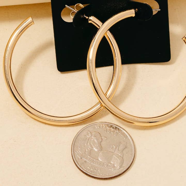 Gold Dipped Large Tube Hoop Earrings for wholesale on Faire