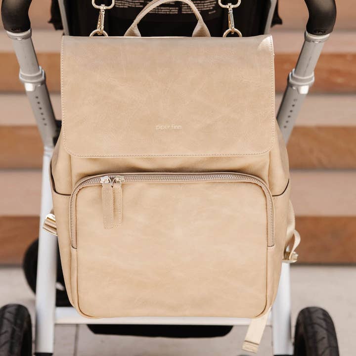 Ganci per passeggino - Taupe per la vendita all'ingrosso da parte di Piper Finn