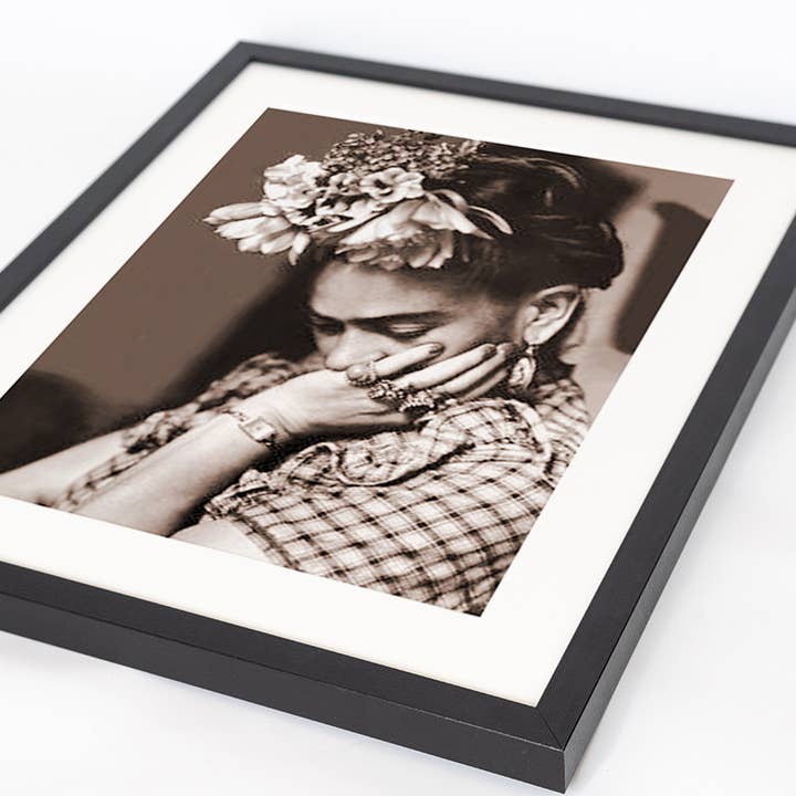 Black Frida Kahlo image. Wall art print with frame. for wholesale on Faire