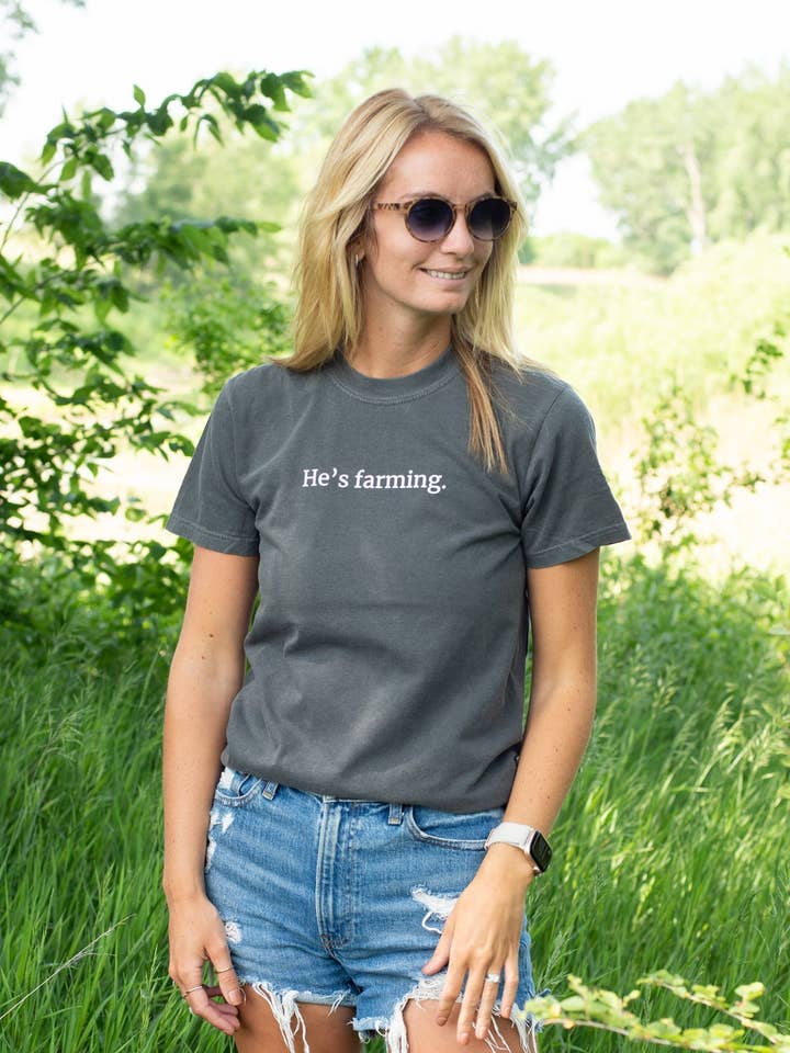 American Farm Company - Wholesale Screen Printed T-Shirt - Women's - Western 'He's Farming.' Charcoal Graphic Comfort Colors Tee2