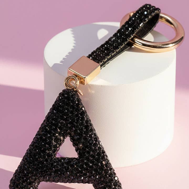 Nero Portachiavi e Ciondolo per Borsa con Lettera Iniziale in Cristallo Nero in vendita all'ingrosso su Faire5