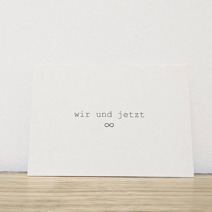 Mini DIN A7 postcard “we & now” - on wood pulp board for wholesale by gute.attribute