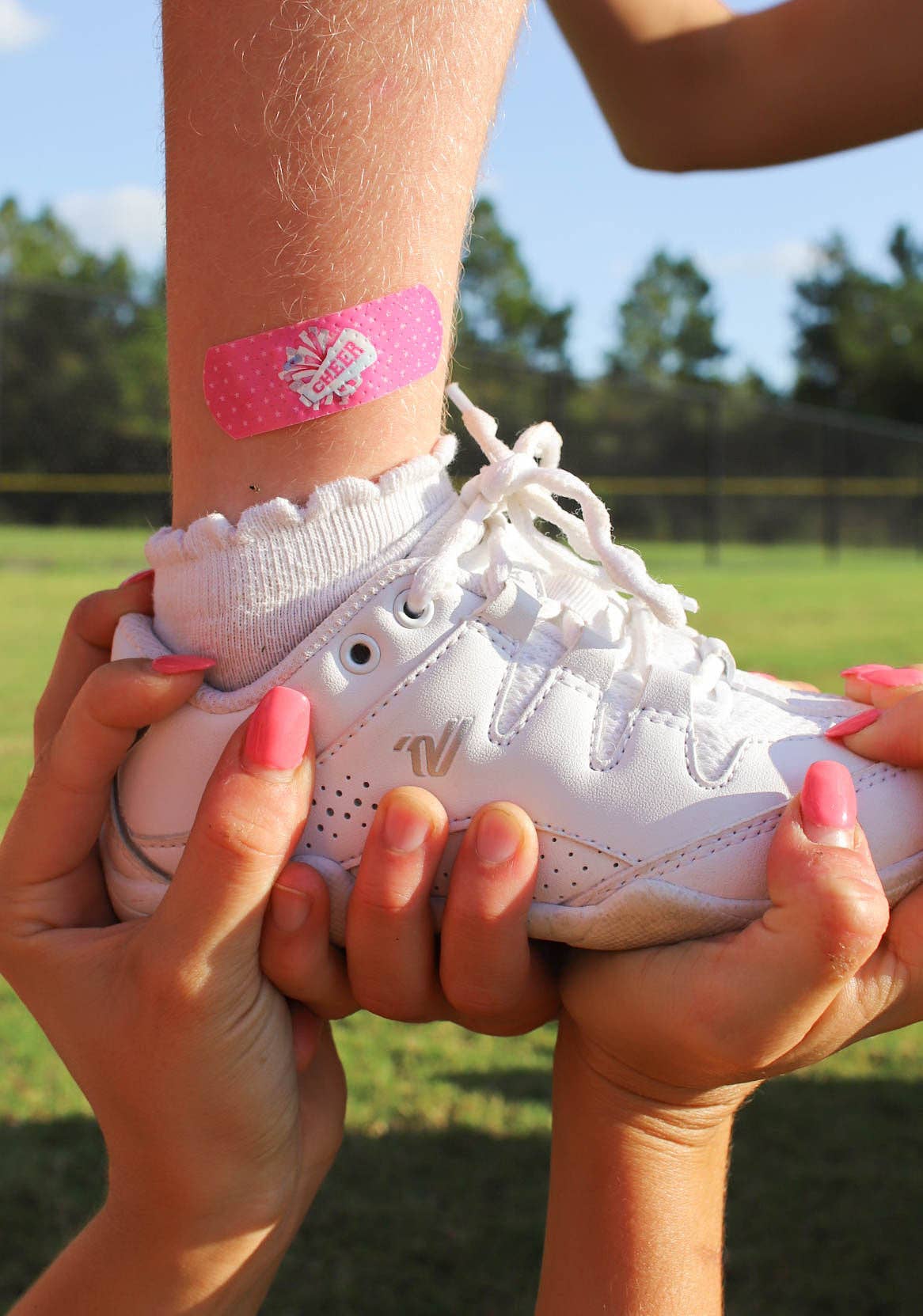 Boo Boo Ball USA - Vendita all'ingrosso Kit di pronto soccorso - Portachiavi Boo-Boo con Pompon Cheer e Kit di Primo Soccorso1