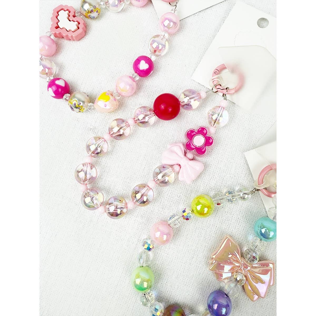 MIX COLOR Pink Palette and Charm keychain and wrist strap for wholesale on Faire7