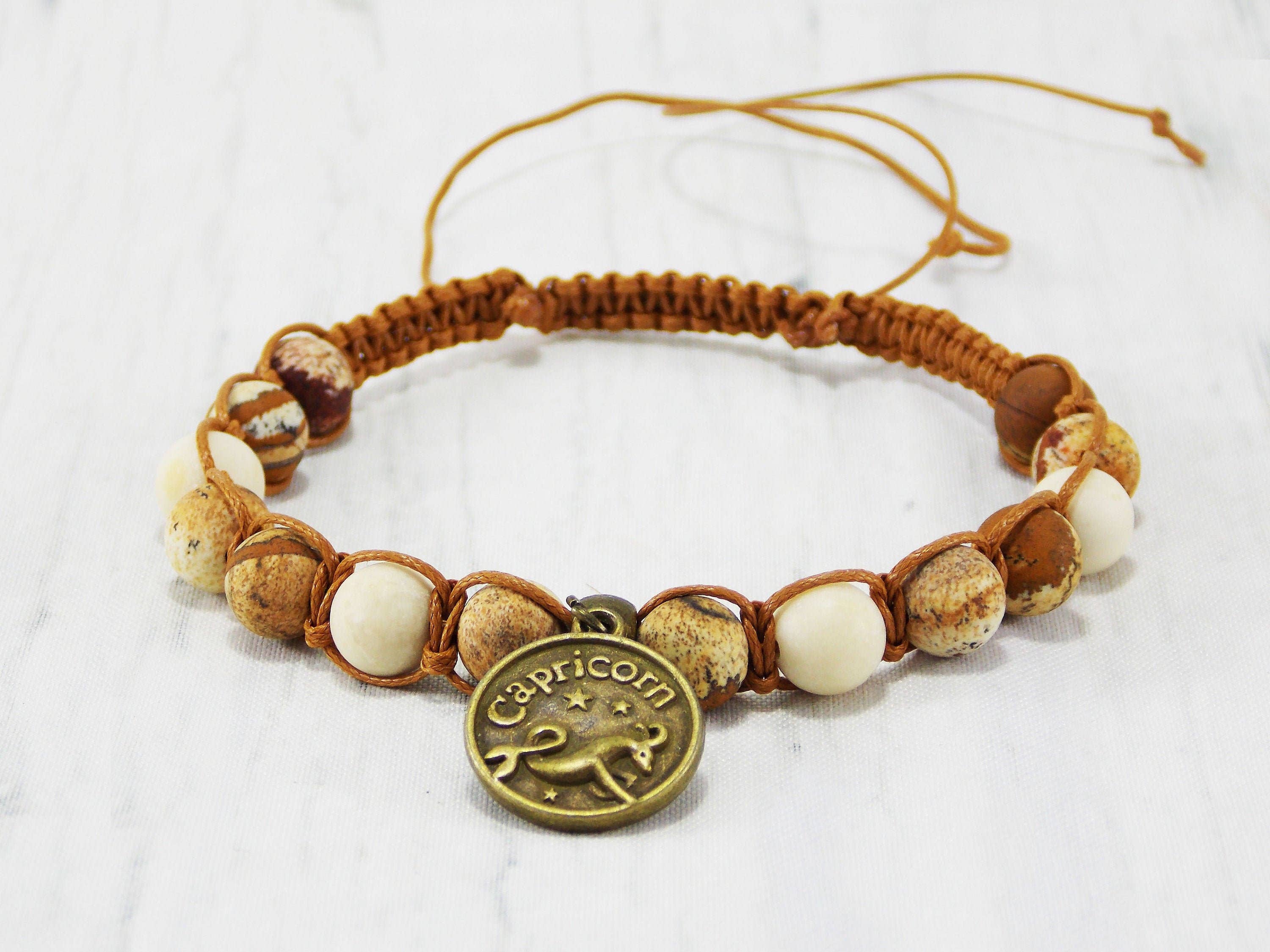 Ninolia - Venta al por mayor Pulseras de abalorios/colgantes - Pulsera Capricornio con dije de signo del zodíaco de cabra de 8 pulgadas de largo, piedra preciosa unakita macramé, regalos de cumpleaños de enero1