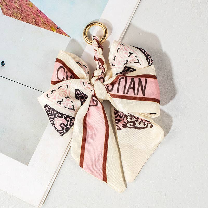 Dipped Shop - Vendita all'ingrosso Accessorio per borsetta - Donna - Ciondolo per Borsa con Fiocco e Stampa di Pizzo Vintage DP25D6762