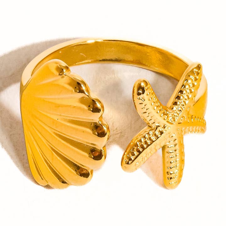 Oro Amarillo Anillo Étoilé de oro de 18 quilates con forma de estrella y concha que no se deslustra de venta al por mayor en Faire0