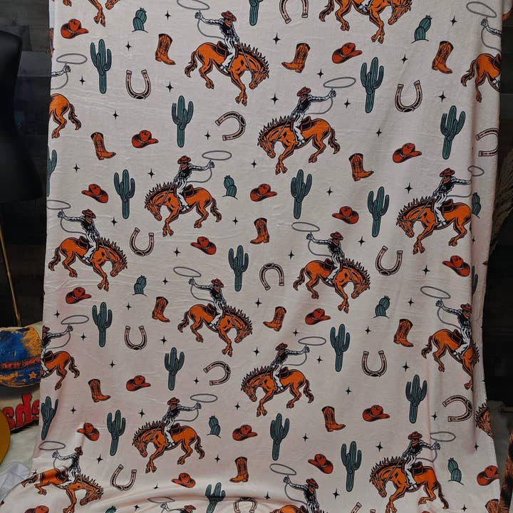 Rodeo Cowboy Throw Blanket Ultra-Soft Micro Fleece Blanket 60" x 80" Made in America for wholesale by BAHA RANCH WESTERN WEAR