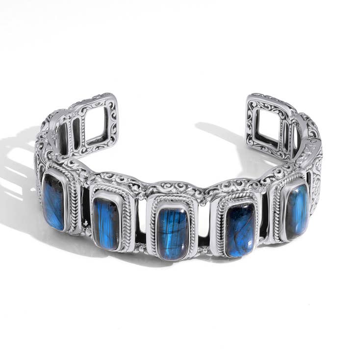 Elegant Intricate Bali Sterling Silver Bangle with Mystical Labradorite Glow for wholesale by Damai Designs