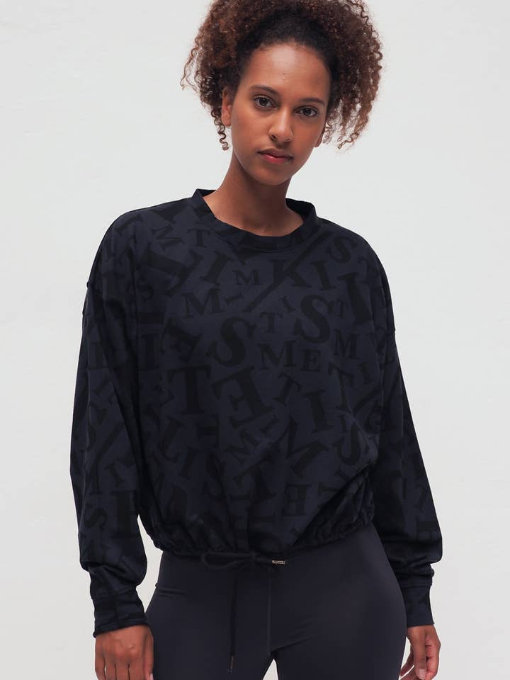 Garuda Anthracite Typo für den Großhandel von Kismet Yogastyle