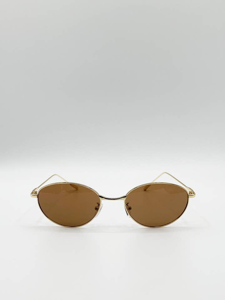Metal Oval Cat Eye Sunglasses In Brown for wholesale by AFA COLLECTIVE