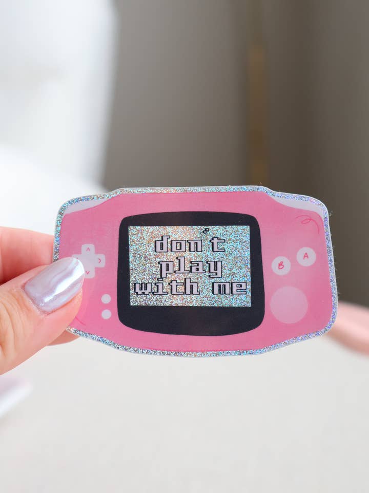 Gameboy - Don't play with me Holographic Sticker for wholesale by Pinkalula