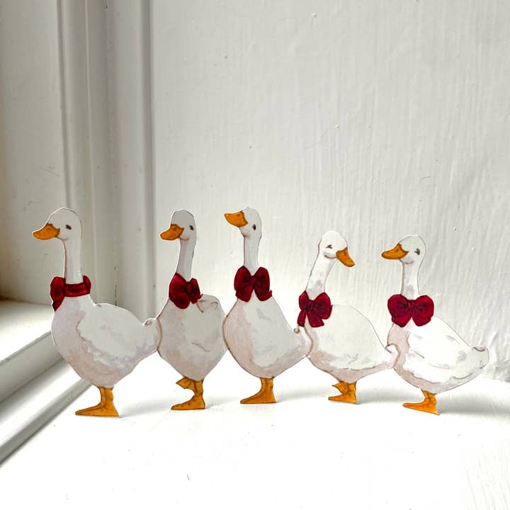 Tall Hat Tales – Großhandel Ausschnitte – Weihnachtspapierausschnitte Gänse in einer Reihe1