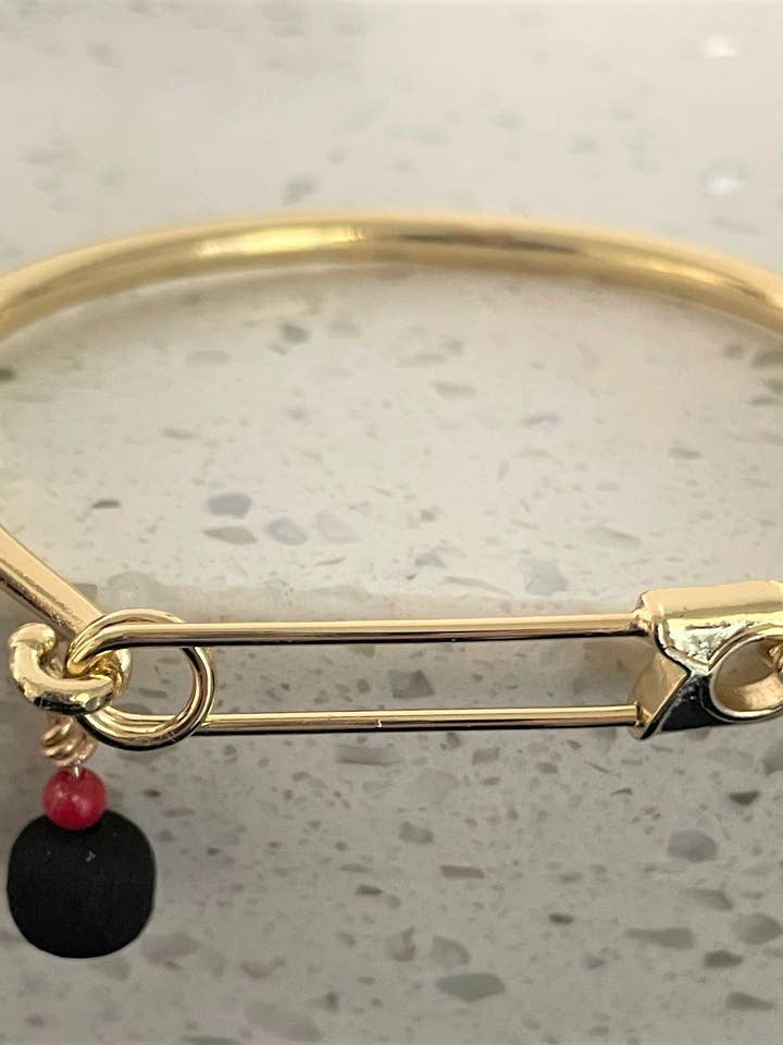 Pulseira Azabache Pin por atacado de Arroz Con Mango