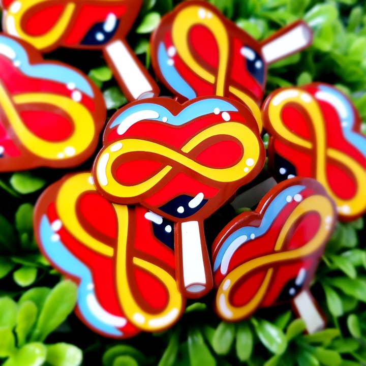 Poly Lolly - Pastry Pride Enamel Pin for wholesale by Fresh Hot Flavors LLC