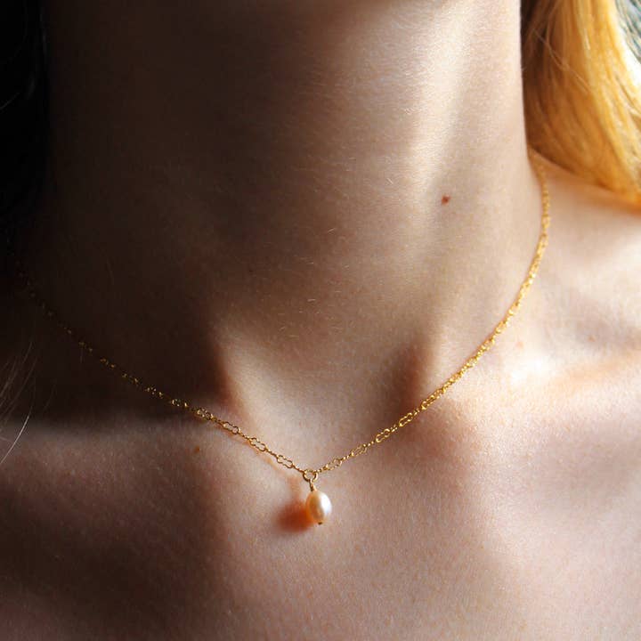 Suspicion necklace for wholesale by CommeUnPapillon