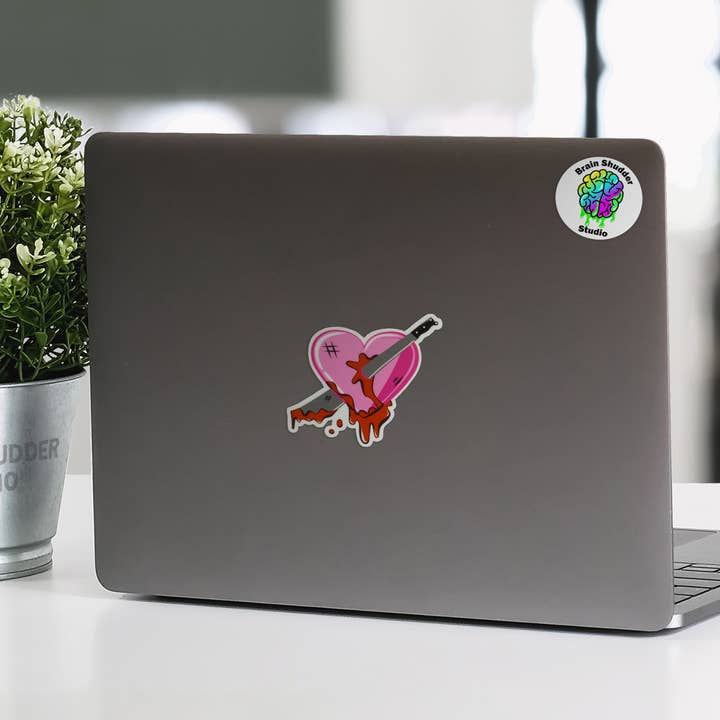 Brain Shudder Studio - Wholesale Sticker - Machete thru Heart Sticker