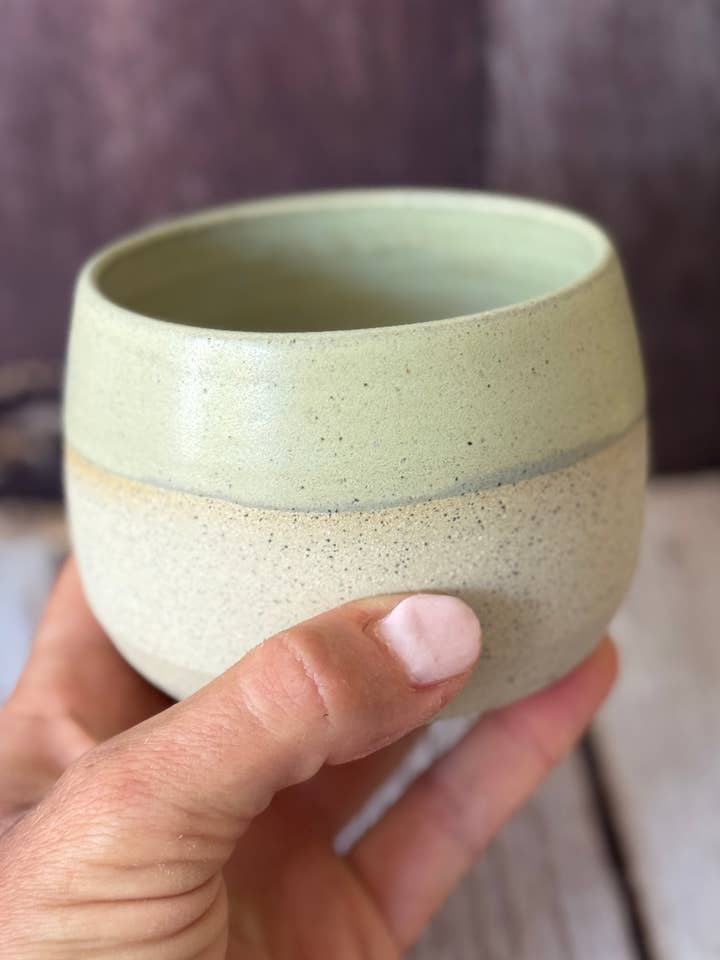 Mini hug mug in matte green-yellow for wholesale by Wolf and Clay Pty Ltd