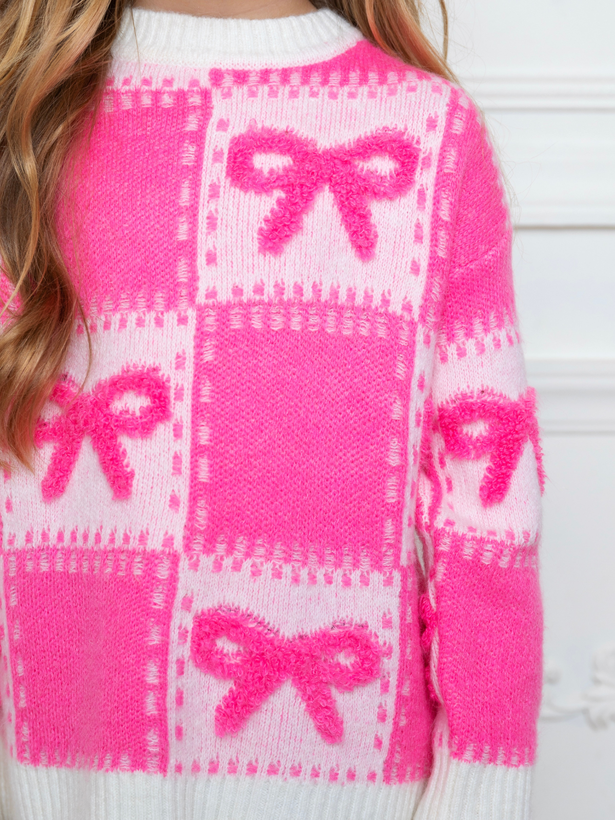 Sweet Bow Pink Checkered Knit Sweater for wholesale on Faire5