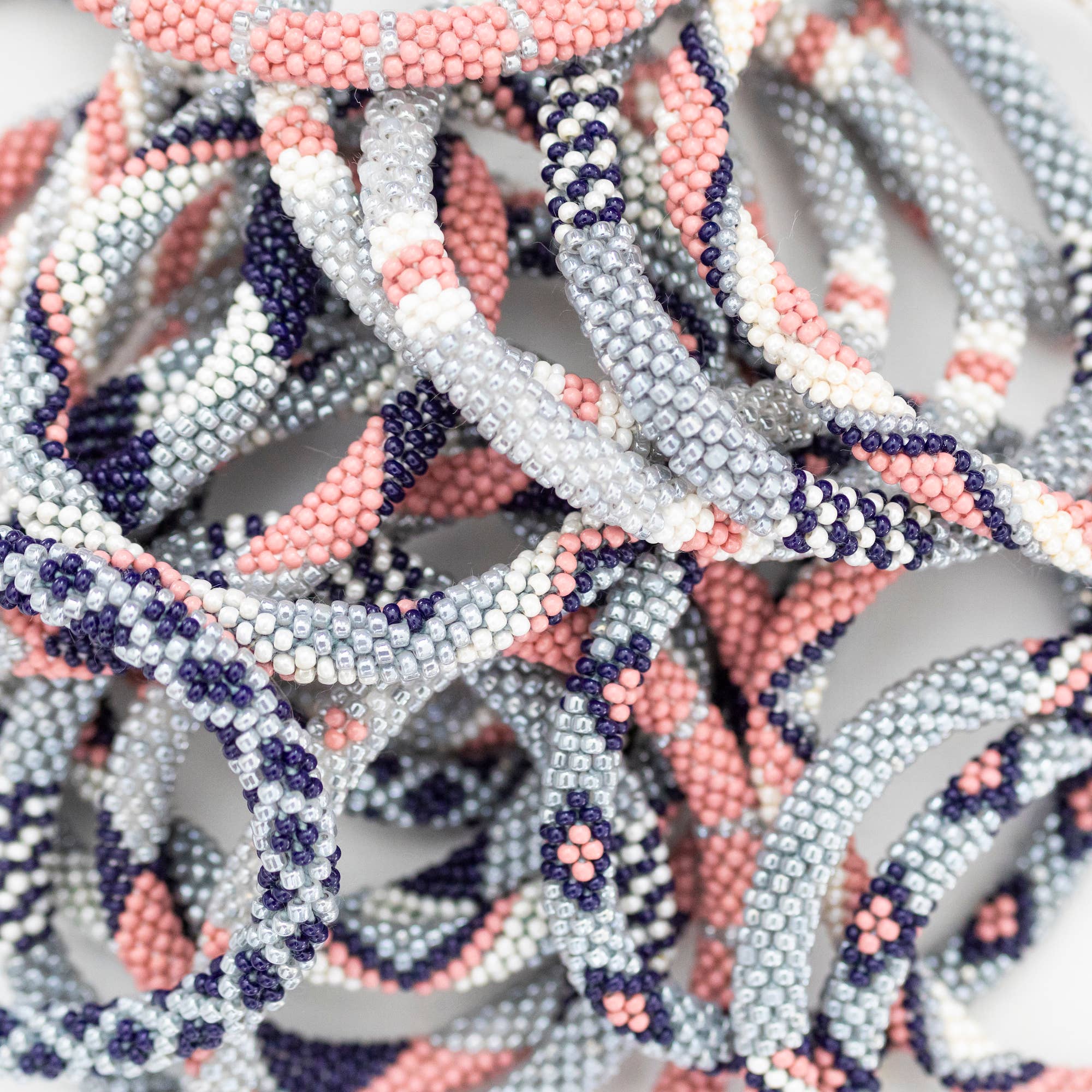 Aid Through Trade - Wholesale Jewelry Set - The Original Roll-On® Bracelet Pixie - Set of 123