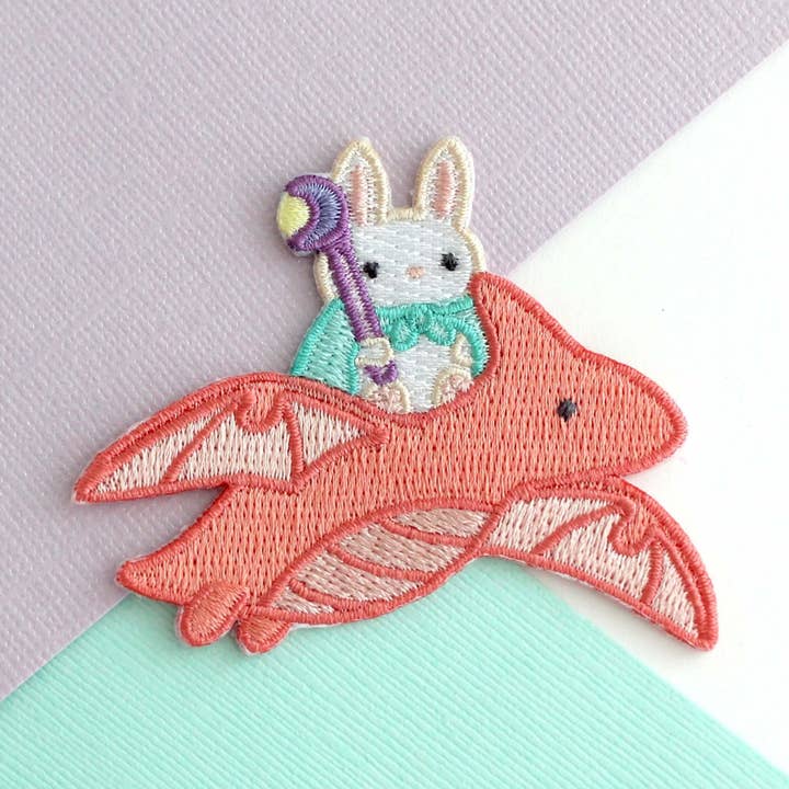 Bunny Mage Riding Dragon Embroidered Iron-On Patch for wholesale by Wild Whimsy Woolies