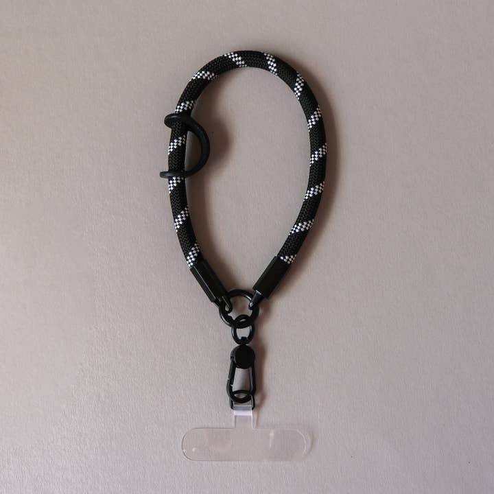 White Black Rope Wrist Phone Strap for wholesale by Talk and Tell