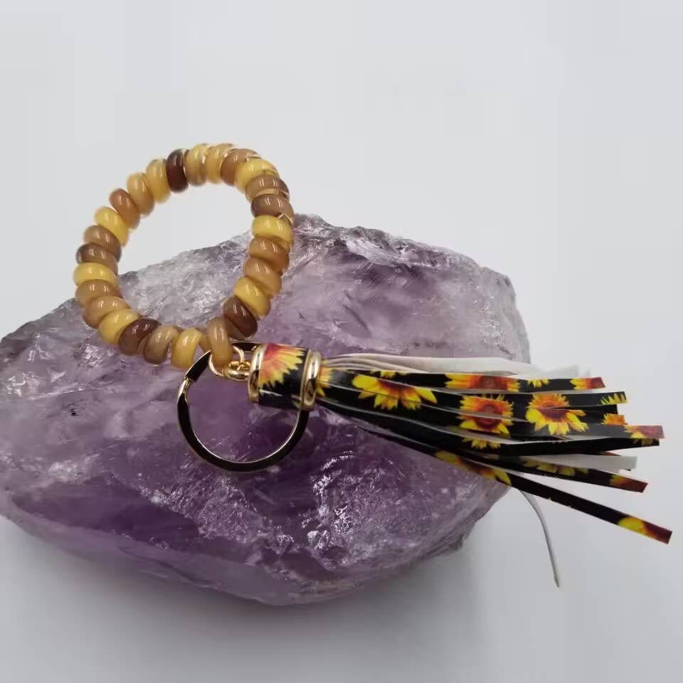 magnolia jewelry - Vente Bracelets porte-clés - Bracelet en silicone avec porte-clés en forme de tournesol1