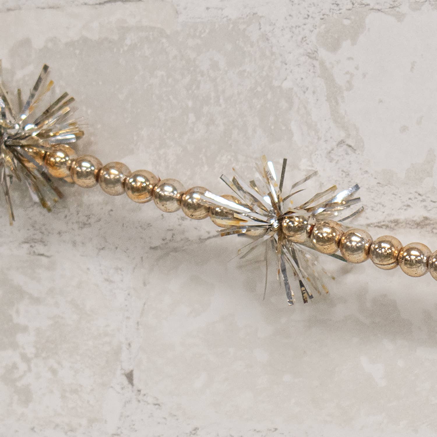 Saybrook Lane - Vendita all'ingrosso Bandierine/Ghirlande - Ghirlanda di Perline e Nastrini Champagne, 110 cm1