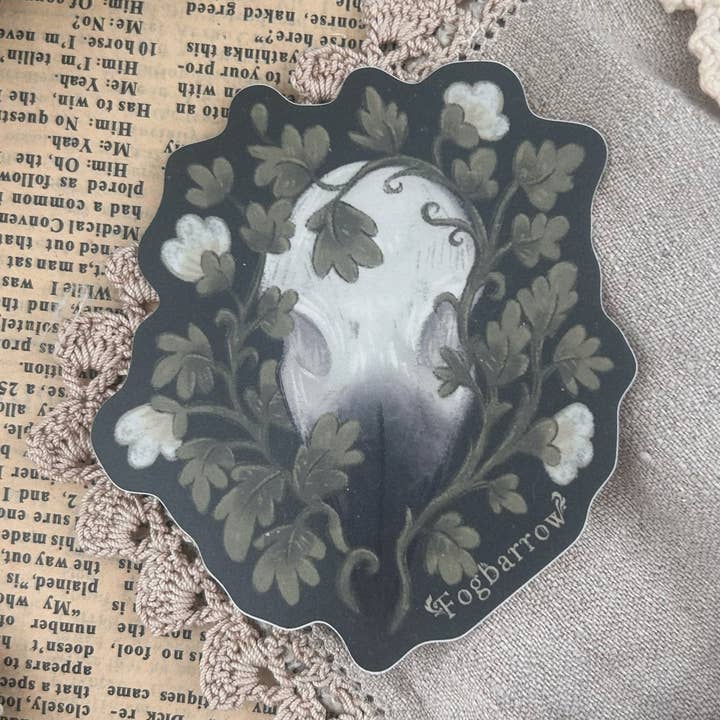 Dark Cottagecore Raven Skull Vinyl Sticker for wholesale by Fogbarrow