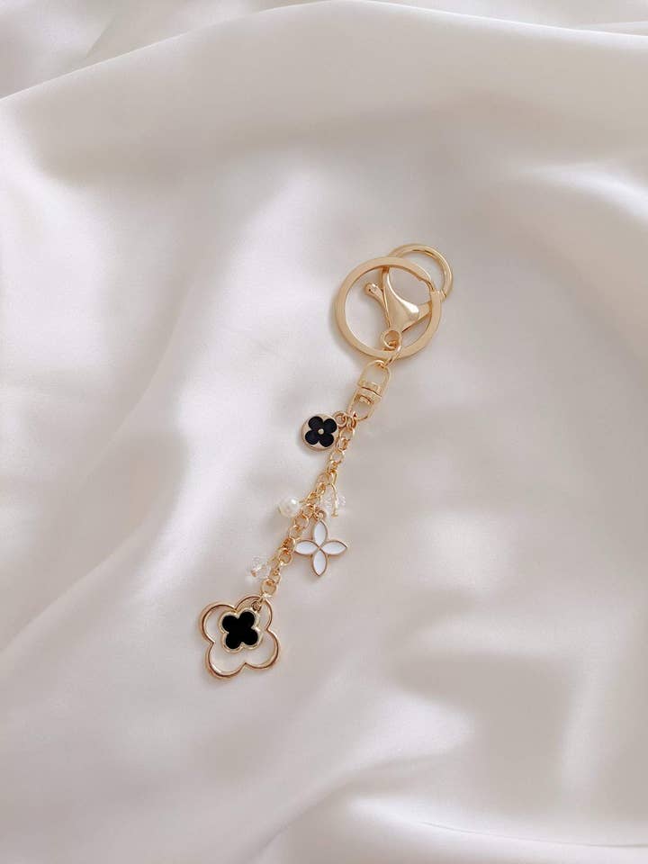 Florecientes Noir nøglering Charme for engroshandel hos Ziaziari