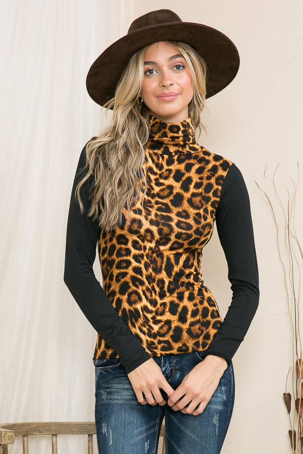 ANIMAL PRINT TURTLE NECK TOP WITH CONTRAST SLEEVES for wholesale on Faire0