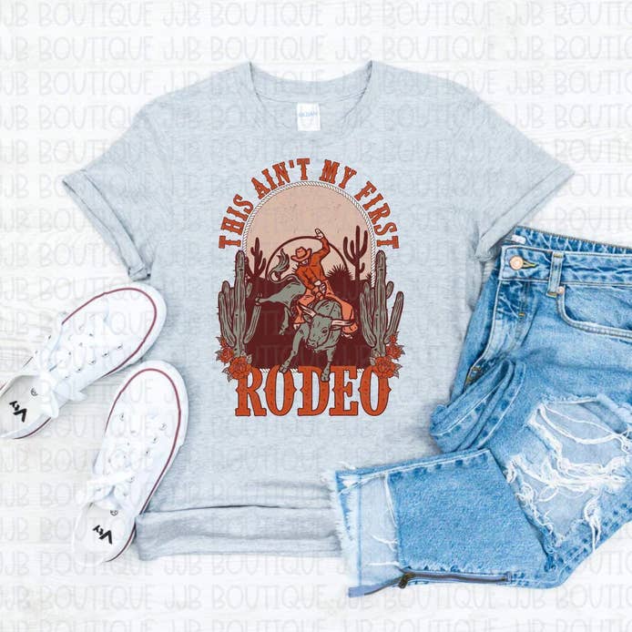 Ain’t My First Rodeo Tee for wholesale by Rockin’ 5A Apparel