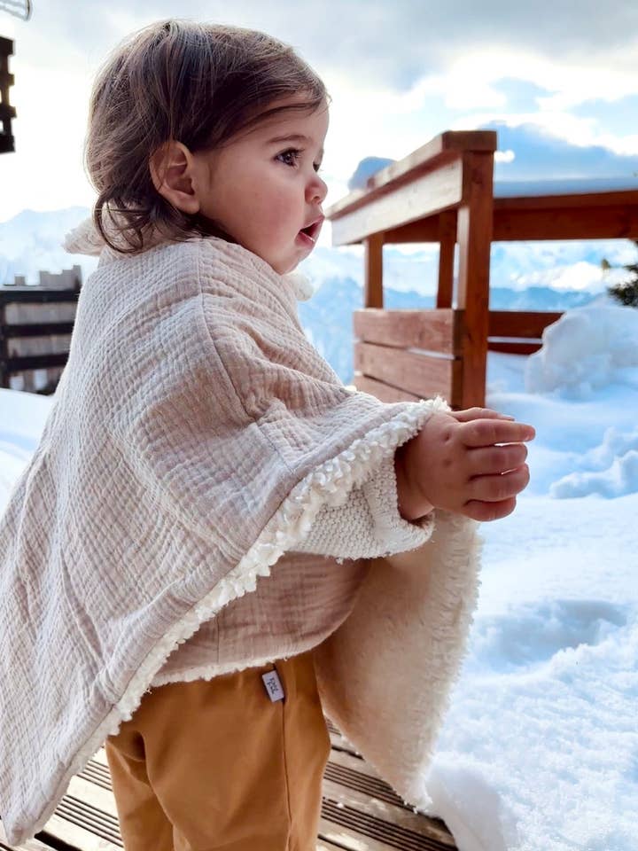 Barnponcho / Ekologisk bomull för wholesale av Petit Pote