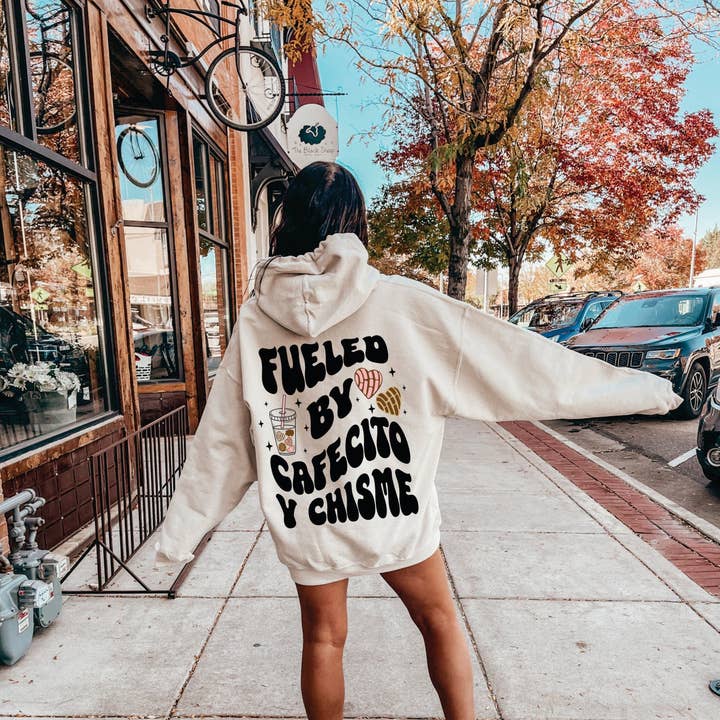 Cafecito Y Chisme Hoodie and other Purchase Wholesale cafecito. Free Returns & Net 60 Terms on Faire trending on Faire.