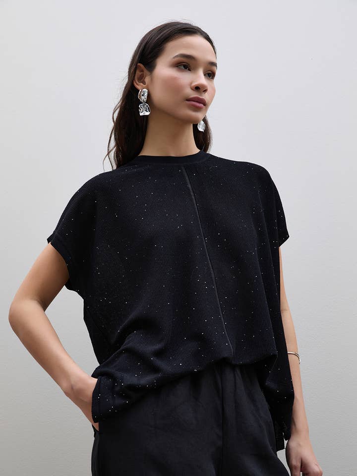 Jersey de punto con lentejuelas y detalles de botones para venta al por mayor de Serianno