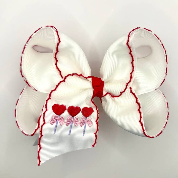 Lollipop Hearts Moonstitch Bow for wholesale by Luminous Sky Bowtique
