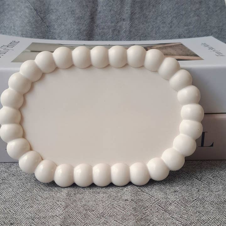 Oval bubbeltallrik för wholesale av Flor de Luz | Velas & Decoração
