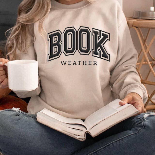 Libro Clima diseño negro en Gildan Unisex Cuello Redondo para venta al por mayor de 417 Designs LLC