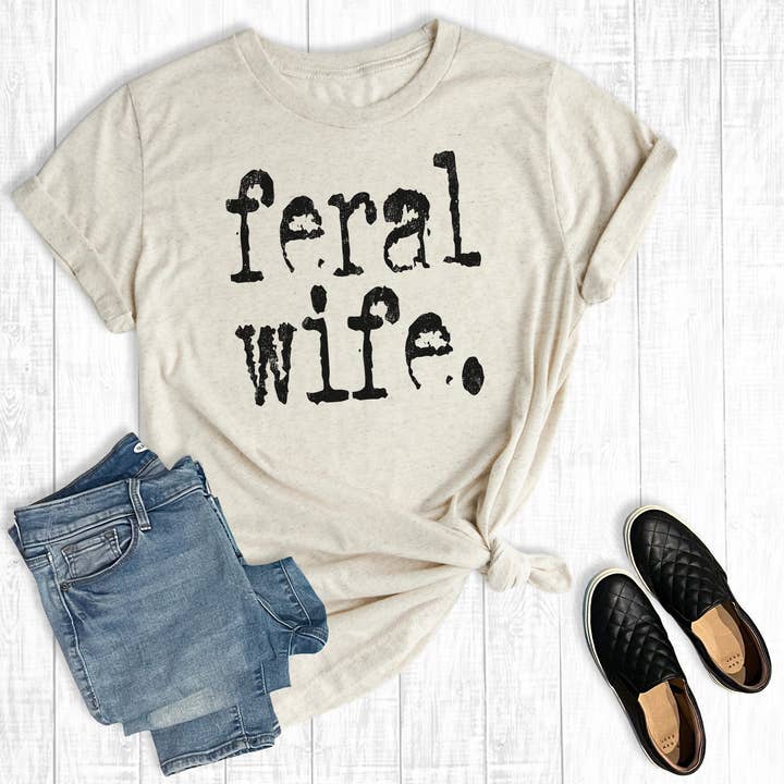 Funny Feral Wife Graphic Tee and other Purchase Wholesale wife beaters. Free Returns & Net 60 Terms on Faire trending on Faire.