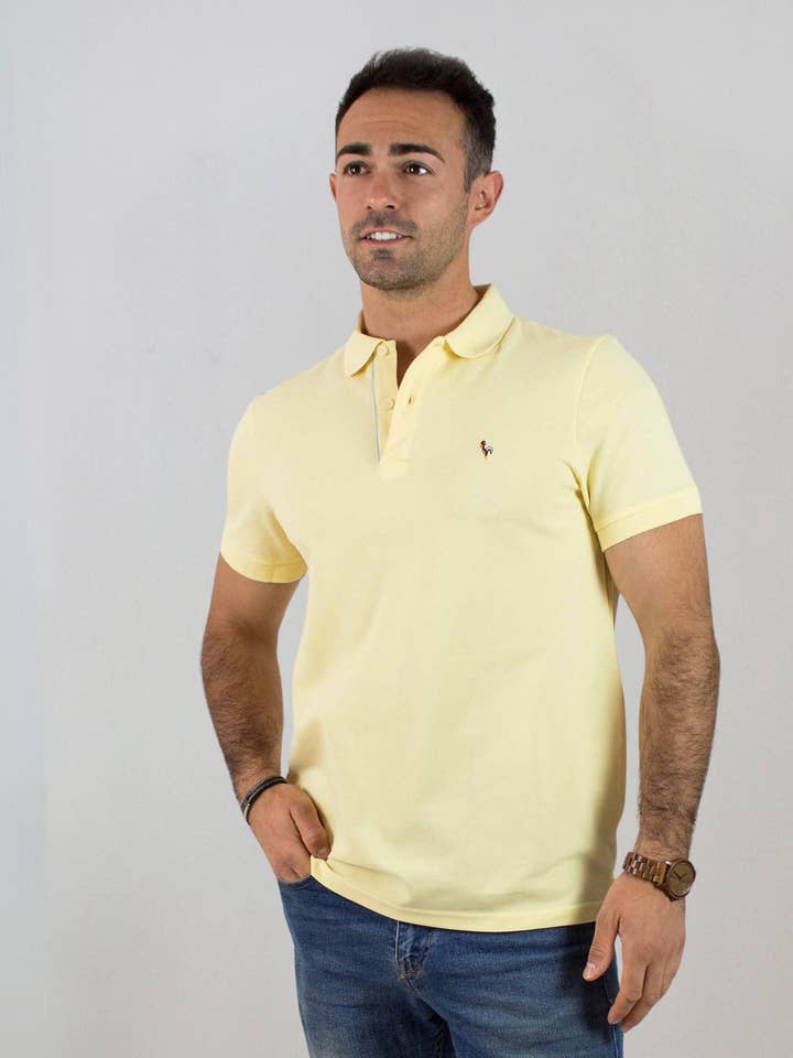 Polo giallo a maniche corte per la vendita all'ingrosso da parte di Patadegayo