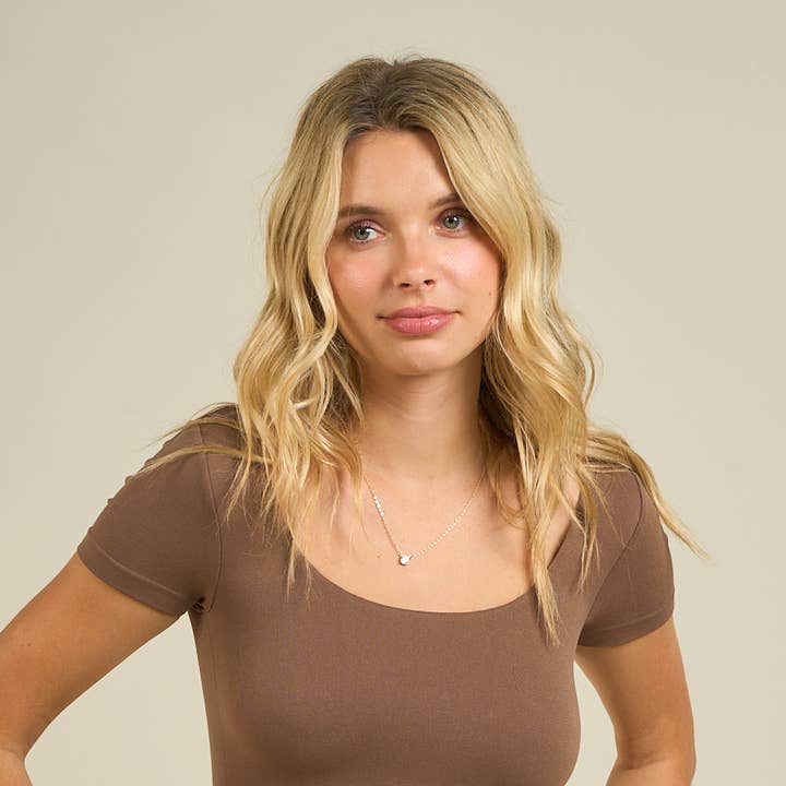 53592 - ROUND NECK HALF SLEEVE TOP and other Purchase Wholesale sm592. Free Returns & Net 60 Terms on Faire trending on Faire.