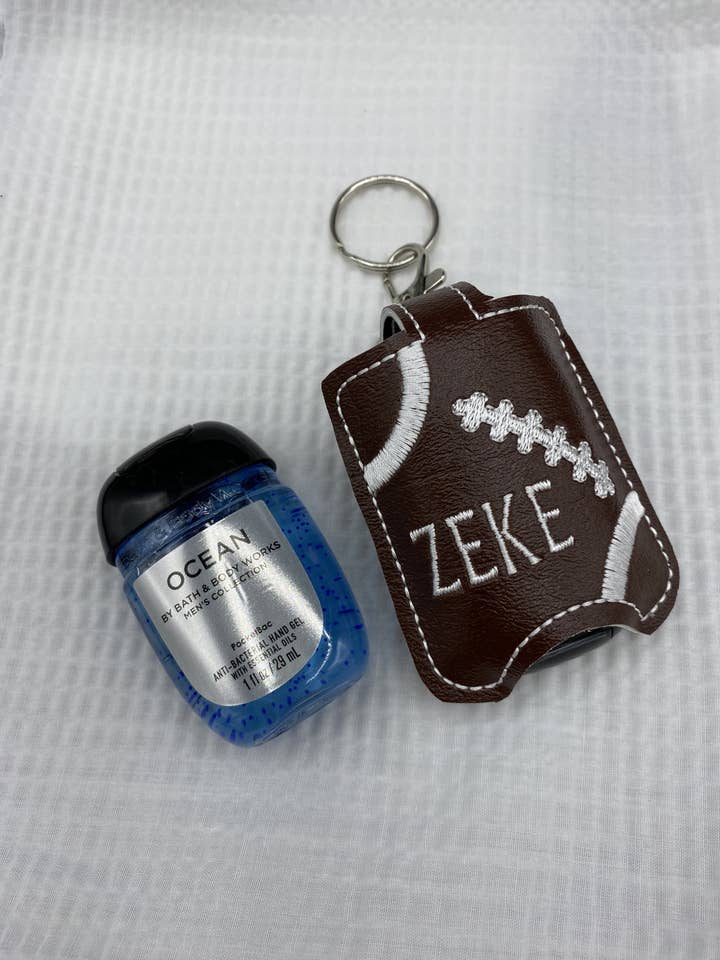 Football Hand Sanitizer Holder Keychain, hand sanitizer. for wholesale by Grandmommy’s Threads