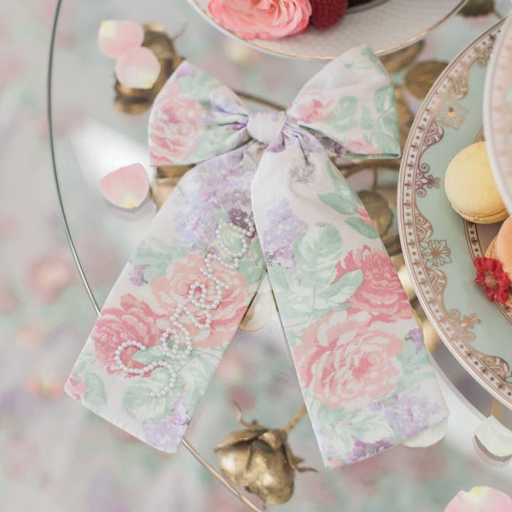 Nœud floral en perles violettes pour la vente par Bebe Theory